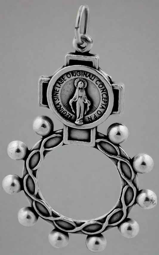 A silver rosary ring