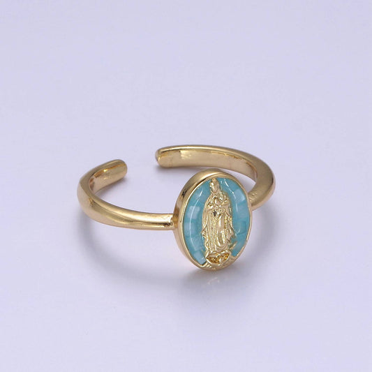 A gold women’s ring featuring a blue background with Mary in gold in an oval shape